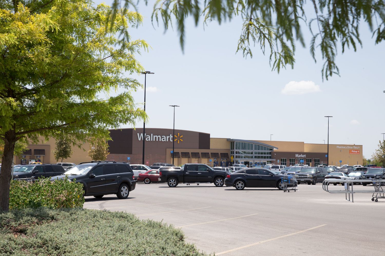 This is a Walmart parking lot where cars and RVs may be free to park overnight. | SUZANNE CORDEIRO/AFP via Getty Images