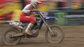 a dirt bike racing in action