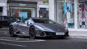 New cars like this grey Lamborghini Huracan, shot from the front 3/4 are heavily discounted for the wealthy