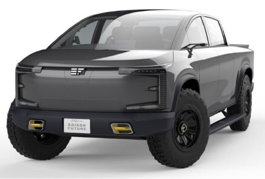 A dark gray EdisonFuture pickup truck against a white background.