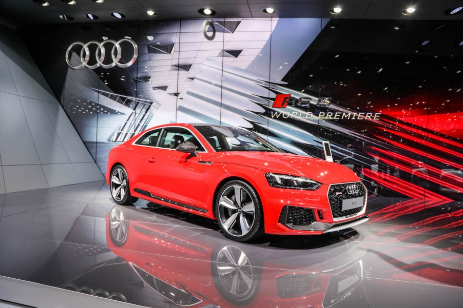 A red 2017 Audi RS5 sport sedan on display at the 2017 Geneva Motor Show in Switzerland