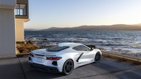 A white 2022 Chevrolet Corvette Stingray with optional spoiler for non-Z51-equipped models