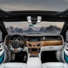 The white and wood interior of the 2022 Rolls-Royce Cullinan.