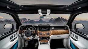 The white and wood interior of the 2022 Rolls-Royce Cullinan.