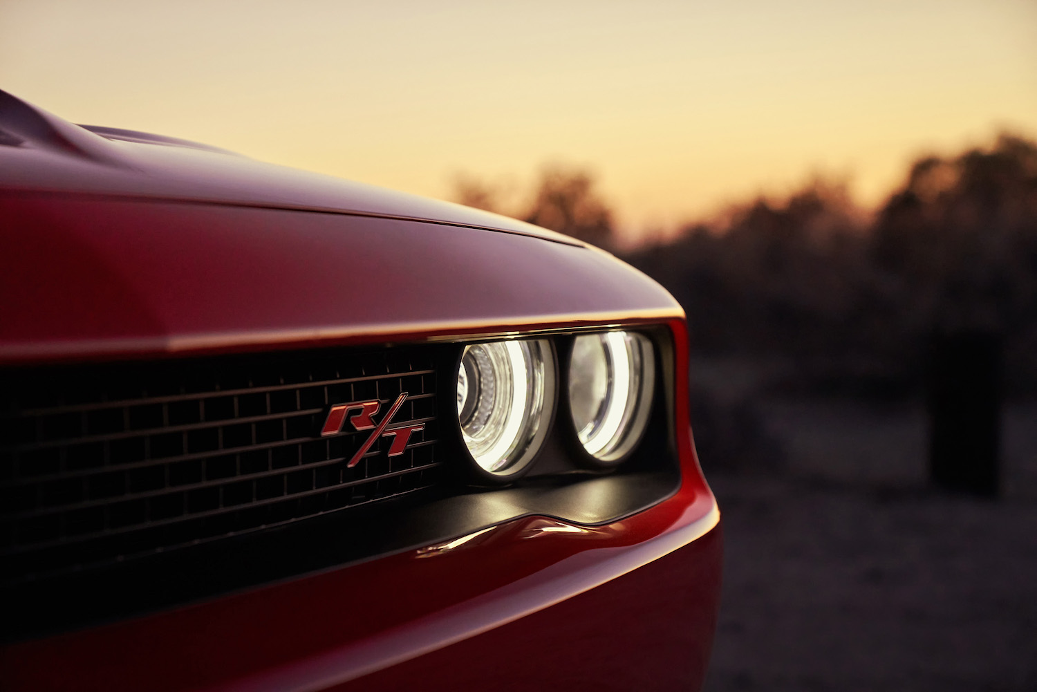 Red muscle car. With a 5.7L HEMI V8, the 2022 Dodge Challenger RT is an obvious upgrade |  Stellantis