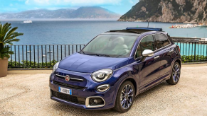 The 2022 Fiat 500X Yacht Club Capri special edition subcompact SUV parked on a villa near the sea