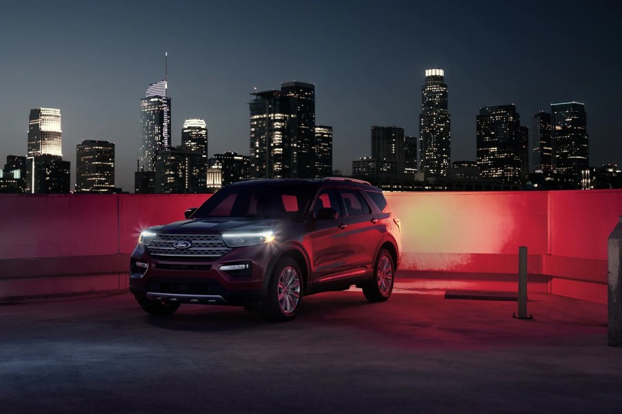 2022 Ford Explorer King Ranch parked with a city background at night with the lights on, is it really worth $54K?