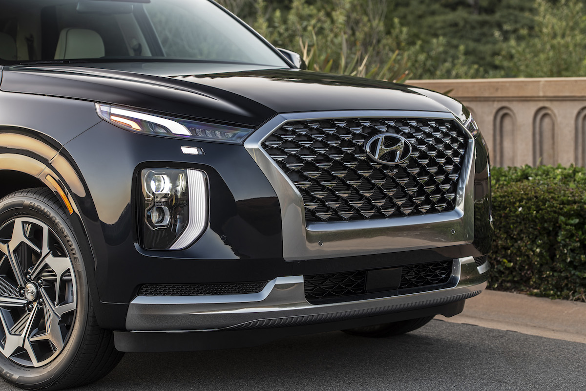 Black 2022 Hyundai Palisade parked on the side of a road