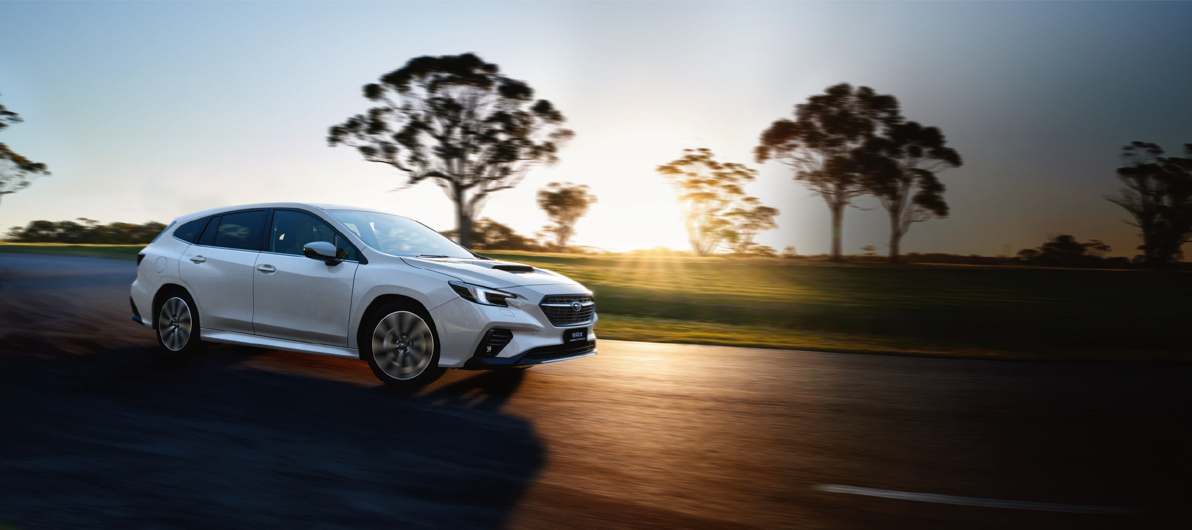 A white Subaru WRX Sportwagon shot from the front 3/4 in Australia