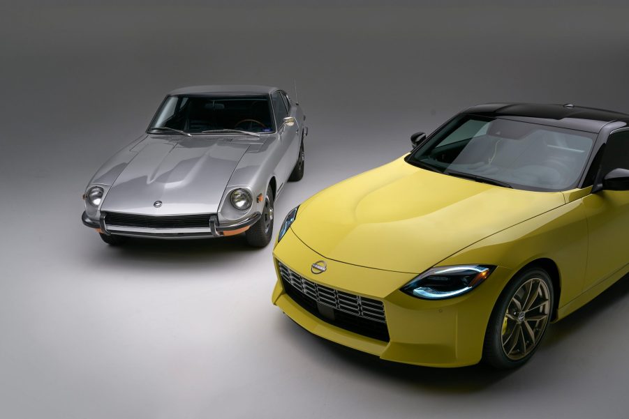 A yellow 2023 Nissan Z shot next to a silver Datsun 240Z