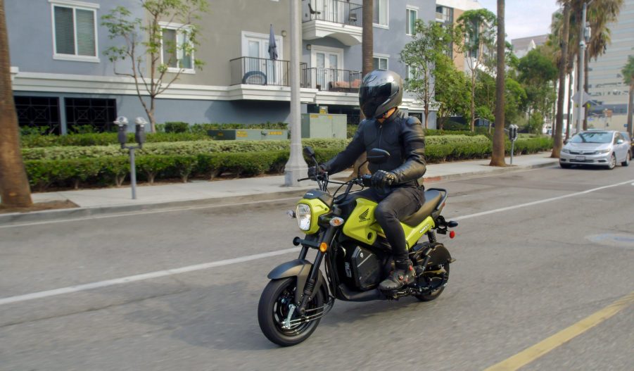 2022 Honda Navi being ridden on the street