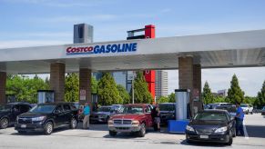 Costco Gas Station with multiple vehicles at the pump.