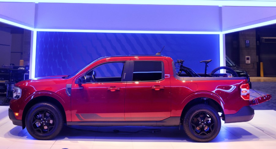 A red Ford Maverick is on display.