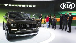 A green 2022 Kia Telluride is on display.