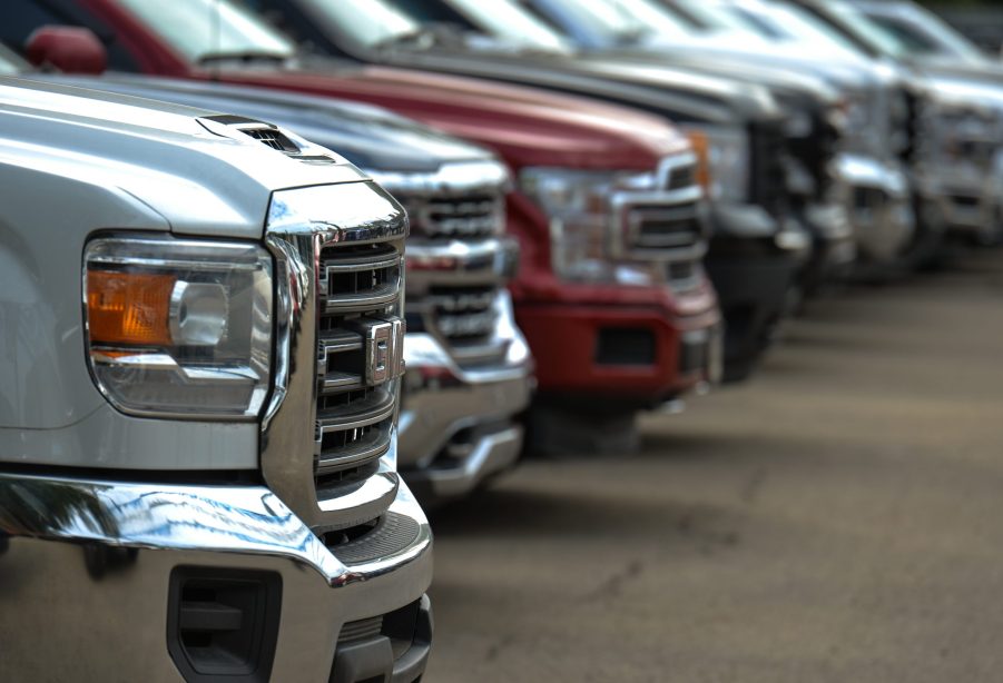 A row of GMC diesel trucks