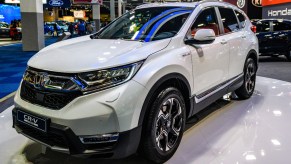 A white Honda CR-V is on display.