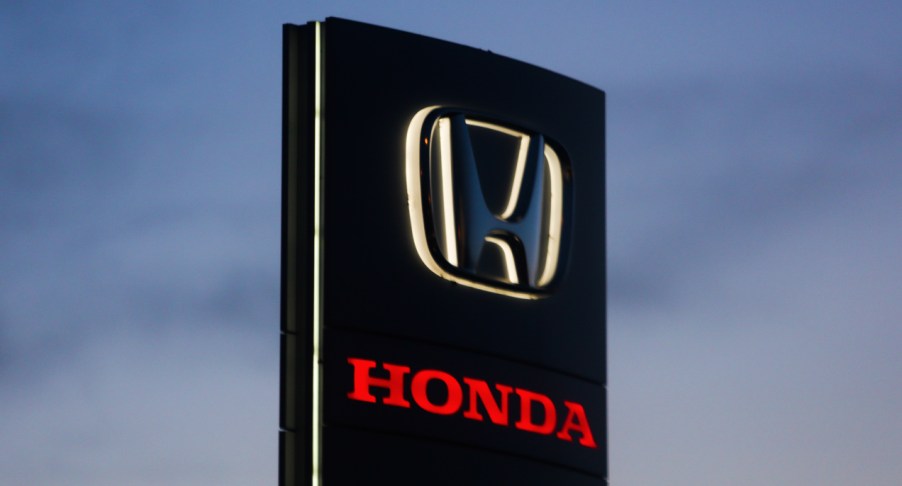 A black Honda logo is seen near the car showroom in Krakow, Poland.