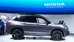 A gray 2022 Honda Passport is on display.