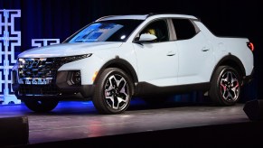 A white 2022 Hyundai Santa Cruz is on display.