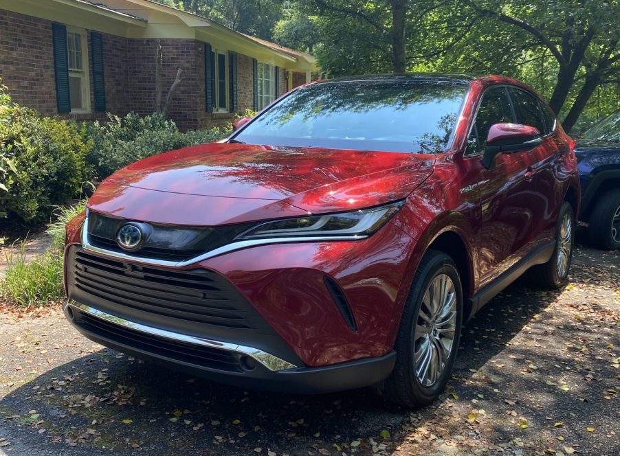 The 2021 Toyota Venza parked near a home.