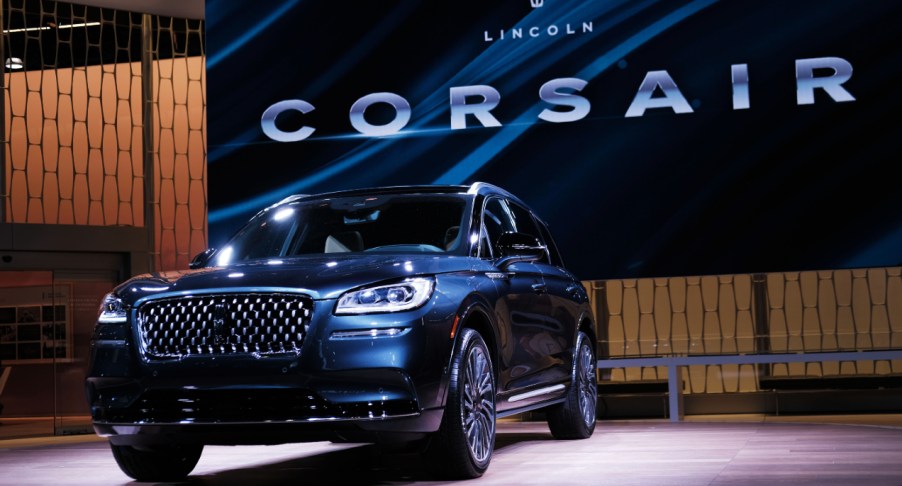 A blue Lincoln Corsair is on display.