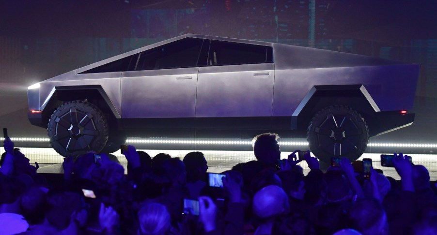 A silver Tesla Cybertruck is on display.