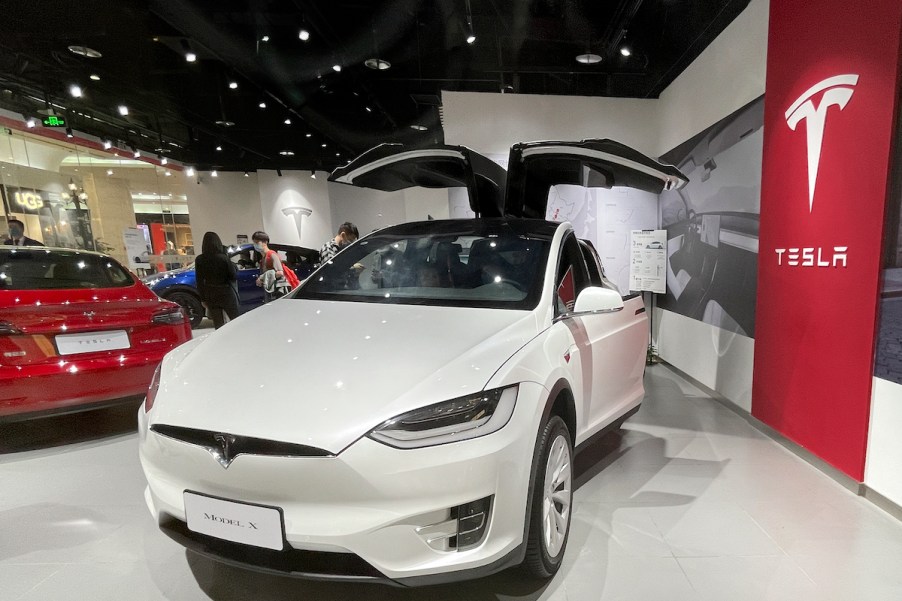 A white Tesla Model X on display in a showroom on February 13, 2021, in Beijing, China