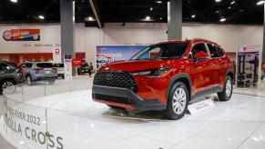 A red 2022 Toyota Corolla Cross is on display.