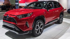 A red 2022 Toyota RAV4 Prime is on display.