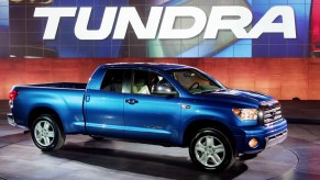 A blue Toyota Tundra is on display.