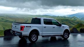 White Ford F-150 with green mountains, highlighting story about pickup driver that saved a choking boy