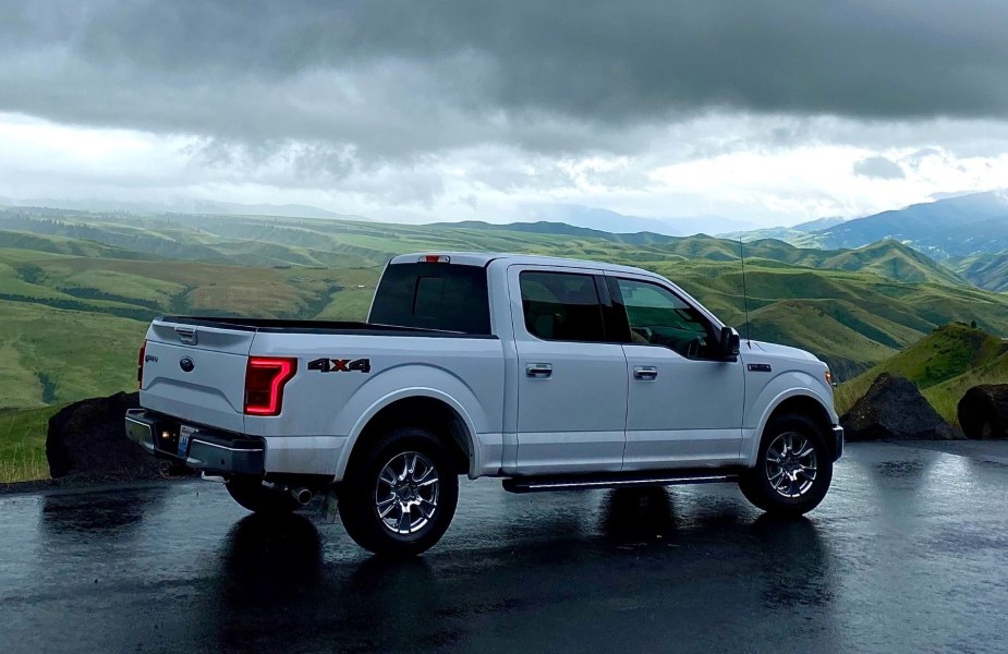 White Ford F-150 with green mountains, highlighting story about pickup driver that saved a choking boy