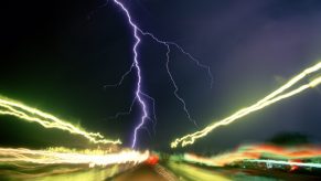 A lightning storm over a freeway