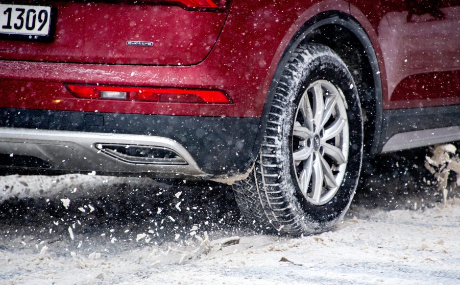 Car tire stuck in snow