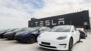 A line of Tesla Model 3 EVs outside a Tesla factory in China