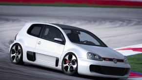 The Bentley-powered Volkswagen GTI hot hatch shot on track from the 3/4 angle