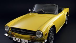 A yellow 1973 Triumph TR6