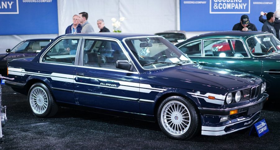 A blue-and-white 1984 E30 Alpina C1 2.3 at a Gooding & Company auction