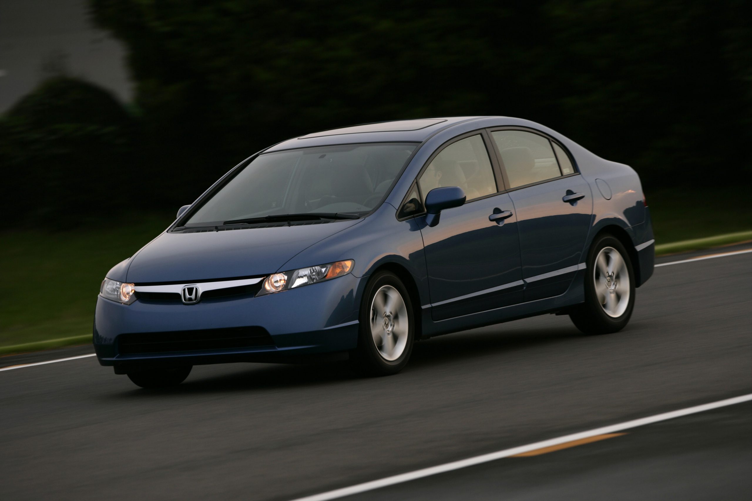 A blue 2008 Honda Civic shot from the front 3/4