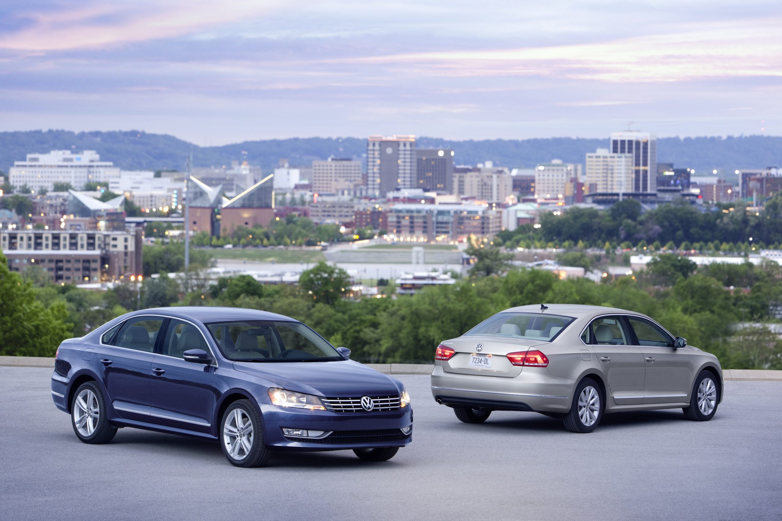 A pair of 2012 B7 models shot overlooking a city