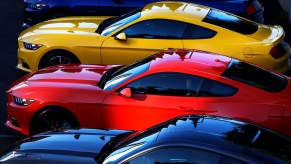 2015 Ford Mustang coupes sit in a parking lot in West Hollywood, California, in 2014