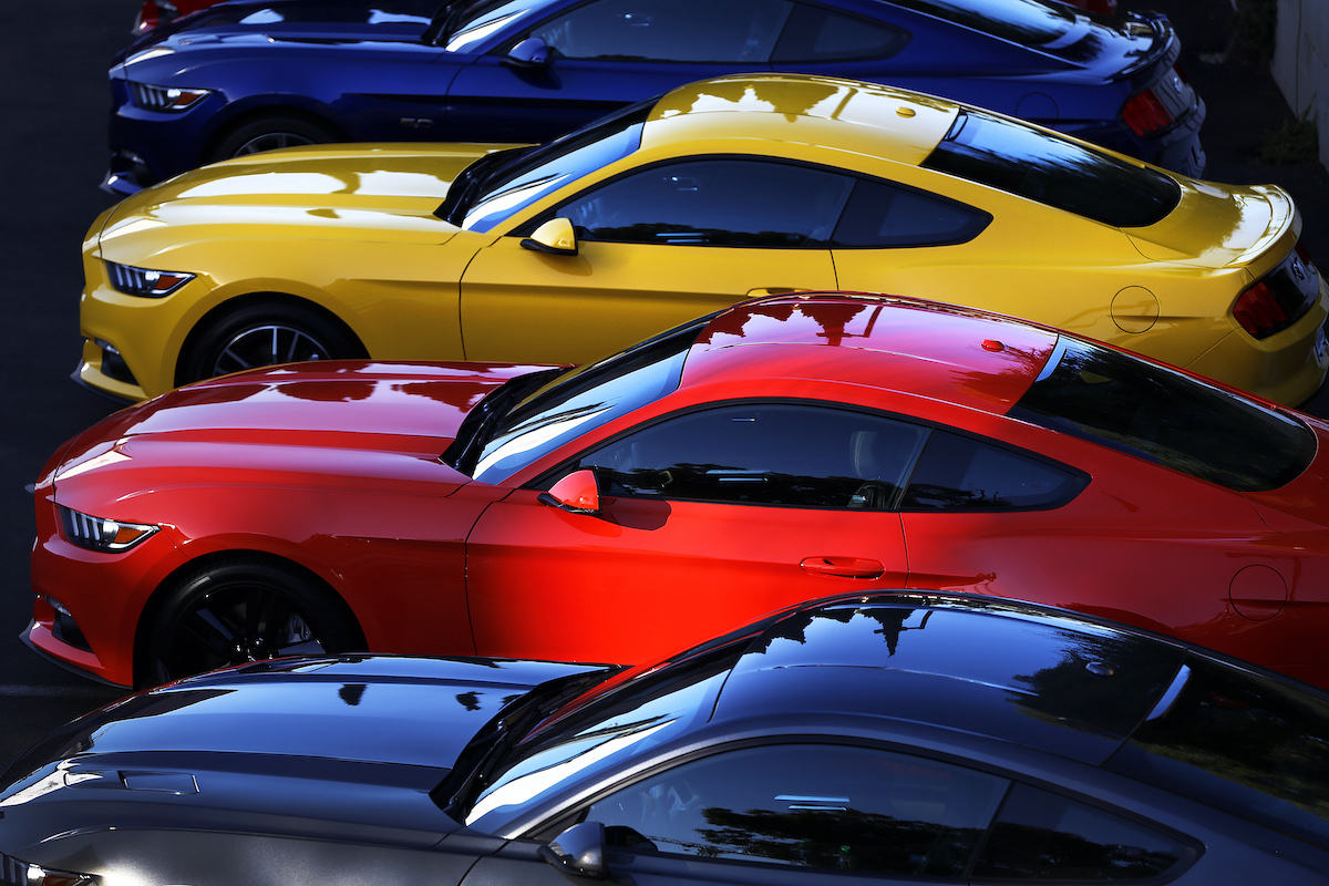 2015 Ford Mustang coupes sit in a parking lot in West Hollywood, California, in 2014