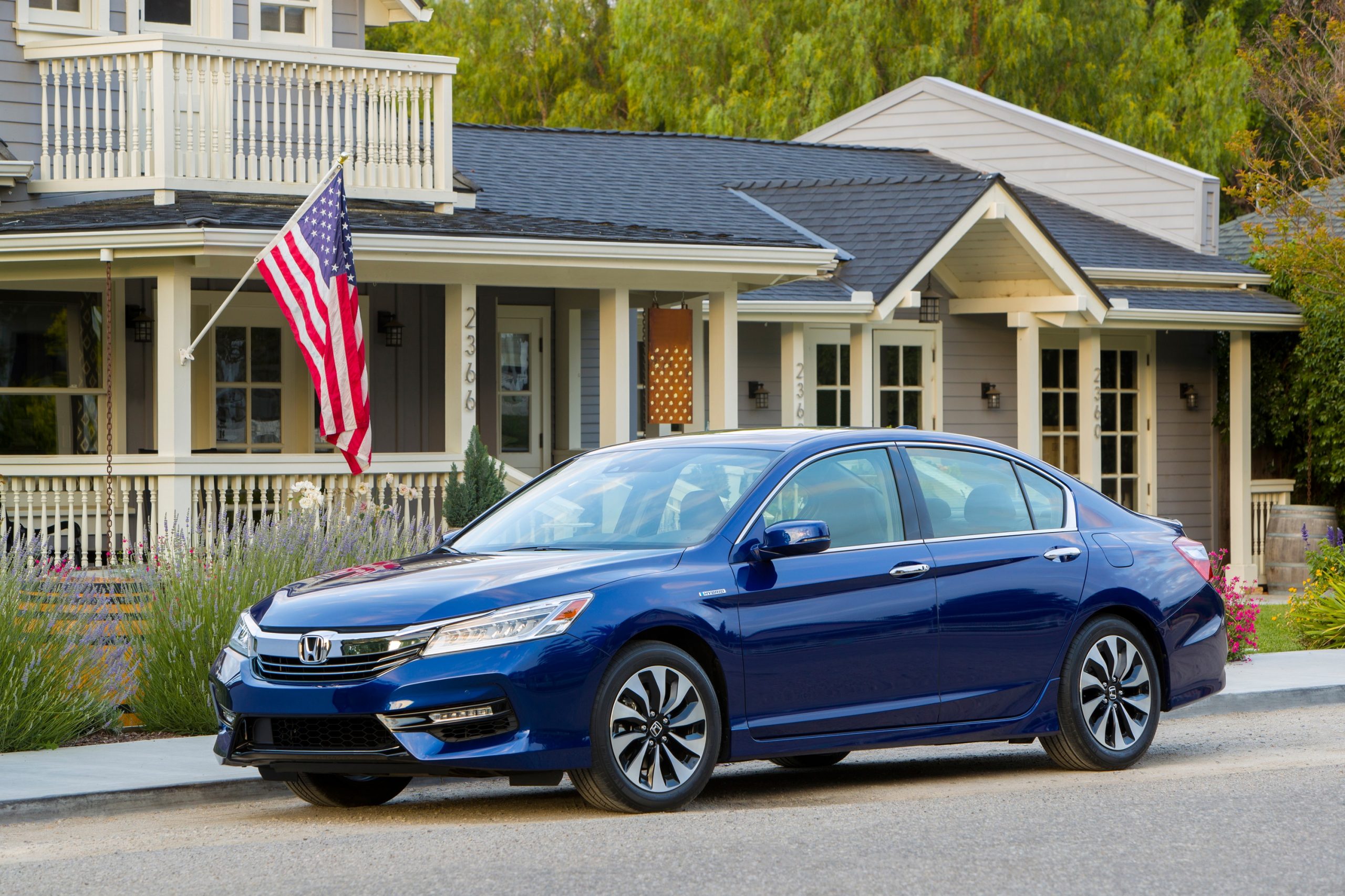 A 2017 Honda Accord, one of the best used cars to buy right now, shot from the front 3/4 in blue.