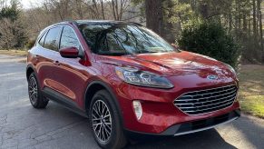 The 2021 Ford Escape PHEV parked near foliage