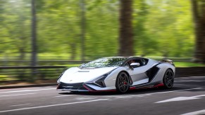 Carbon fiber body parts on a 2021 Lamborghini Sián FKP 37 driving in London, England