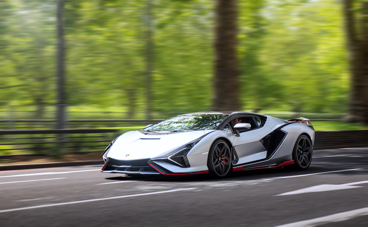 Carbon fiber body parts on a 2021 Lamborghini Sián FKP 37 driving in London, England