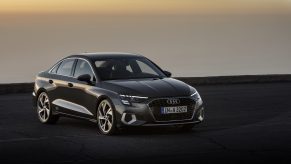 A grey 2022 Audi A3 luxury car shot from the 3/4 angle at sunset