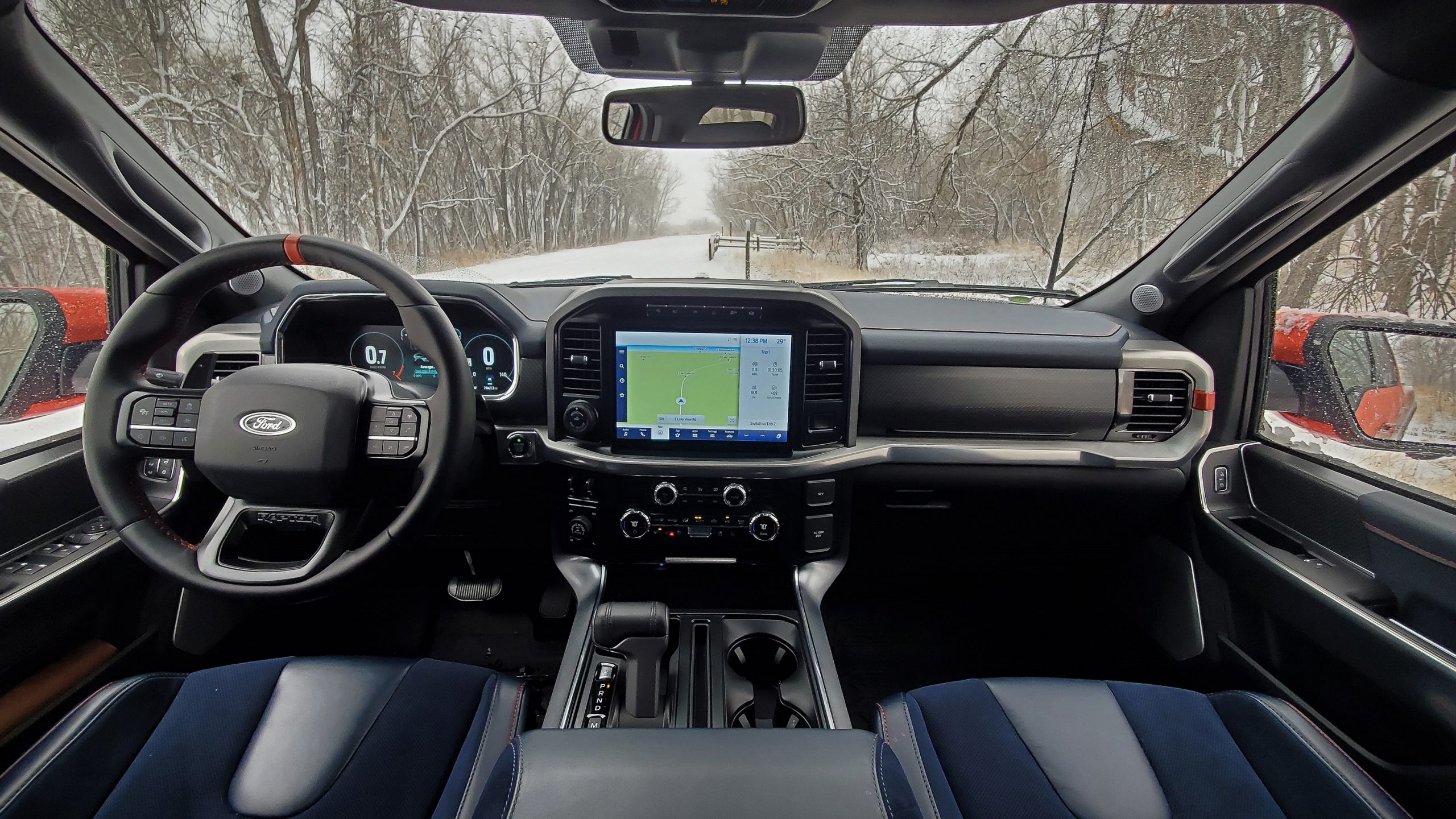 The 2021 Ford Raptor's blue and orange interior shot from the center console