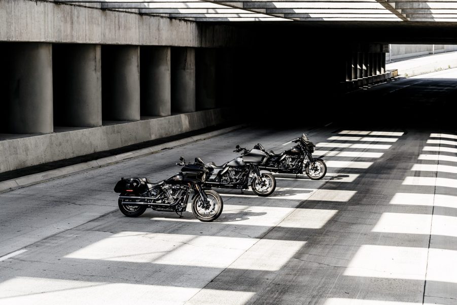 A black 2022 Harley-Davidson Low Rider ST behind a gray Road Glide ST behind a black Street Glide ST