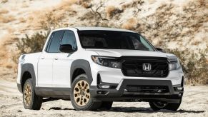 A 2022 Honda Ridgeline Sport unibody midsize pickup truck with the HPD Package parked in the middle of a desert